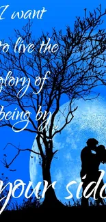 Silhouette of a couple under a blue moon with love quote.