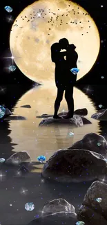 Silhouette of couple under full moon reflecting on rocky water.