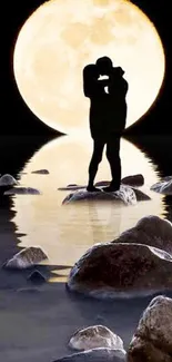 Silhouetted couple embraces beneath a full moon, reflecting on water.