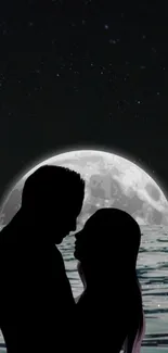 Silhouette of a couple against a moonlit ocean background, perfect for romance.