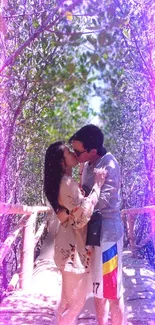 Couple kissing in a vibrant forest with purple hues and sunlight streaming through.