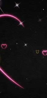 Black wallpaper with pink neon heart design.