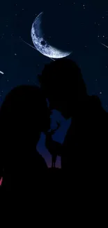 Silhouette of couple under a starry night sky with a crescent moon.