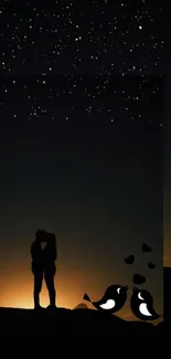 Silhouetted couple under a starry sky with romantic theme.