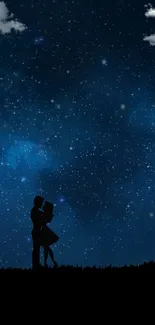 Couple silhouetted under a starry night sky, embracing romance and tranquility.