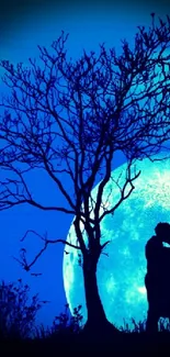 Romantic silhouette under blue moon wallpaper.