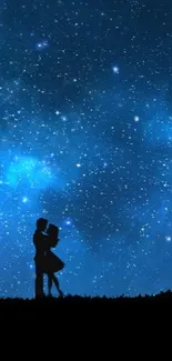 Romantic couple silhouettes under a starry, cosmic blue night sky.