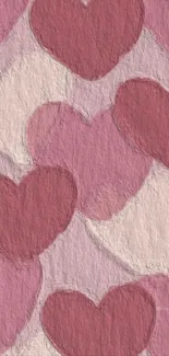 Textured pink heart wallpaper for mobile with a romantic design.