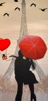 Romantic Paris wallpaper with couple silhouette and red umbrella.