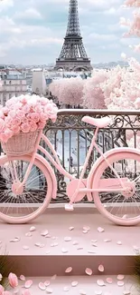 Pink bicycle with flowers in front of Eiffel Tower.