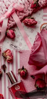 Romantic pink floral wallpaper with roses and perfume.