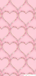 Pink hearts with floral accents on a mobile wallpaper.