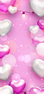 Vibrant pink and white heart balloon wallpaper with string lights.