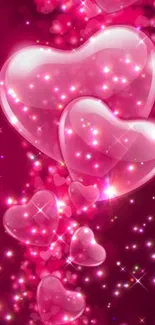 Romantic pink heart wallpaper with sparkles.