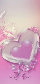 Romantic pink heart wallpaper with floral accents on a gradient background.