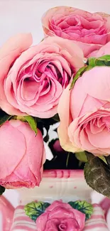 Mobile wallpaper featuring romantic pink roses in a floral arrangement.