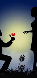 Silhouette of a proposal with a heart in sunset background.