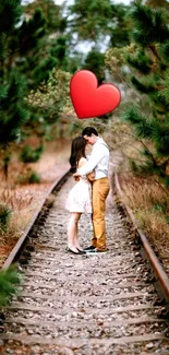 Romantic couple on a railway track with heart symbol.