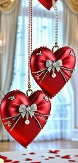 Elegant red heart decorations with silver details hanging in a luxurious room.
