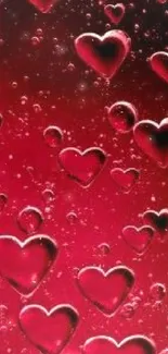 Mobile phone wallpaper with vibrant red heart bubbles on a dark background.