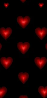 Red hearts pattern on black background wallpaper.