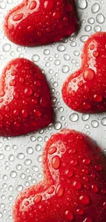 Romantic red heart wallpaper with droplets.