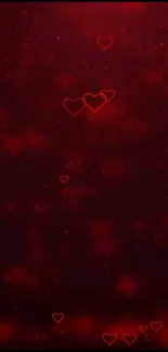 Dark red mobile wallpaper with glowing heart patterns.