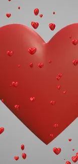 Bright red heart wallpaper with small hearts on gray background.