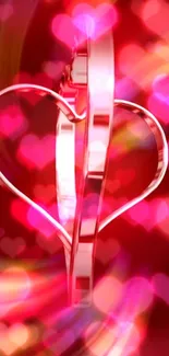 Vibrant red heart wallpaper with glowing bokeh effects and glossy design.