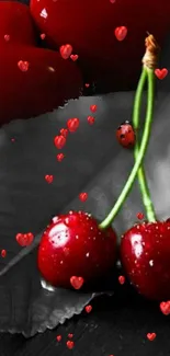 Mobile wallpaper with red hearts, cherries, and a ladybug on a leaf.