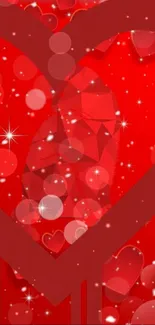 Vibrant red heart wallpaper with sparkles.