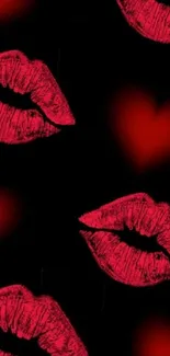 Red lips and hearts on dark background wallpaper.