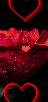 Red rose with water droplets and heart accents on a black background.