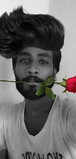 Monochrome portrait with red rose accent.