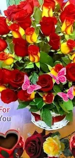 Romantic bouquet with red and yellow roses, butterflies, and hearts.