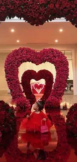 Romantic rose heart archway with child in red dress.