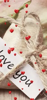 Romantic wallpaper with pink roses and heart-shaped card.