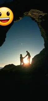 Silhouette of couple under archway at sunset with an emoji overhead.