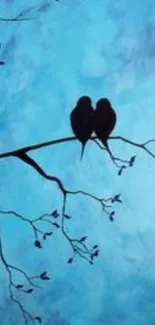 Two silhouetted birds on a blue sky backdrop with branches.