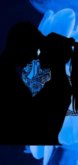 Silhouette of a couple with a blue floral background.