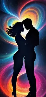 Romantic couple silhouette with vibrant cosmic heart background.