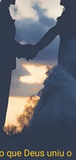 Silhouette of couple holding hands at sunset with romantic text.