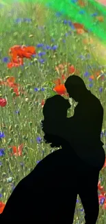 Silhouette couple in colorful field with wildflowers and a rainbow.