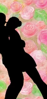 Silhouette of a couple embracing with pink floral background.