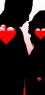 Silhouette couple with red hearts wallpaper.