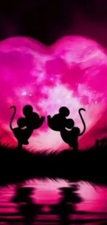 Romantic silhouette of two mice against a glowing pink heart moon reflection.