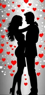 Romantic silhouette of a couple with hearts