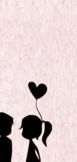 Silhouette couple with heart balloon on pink wallpaper.