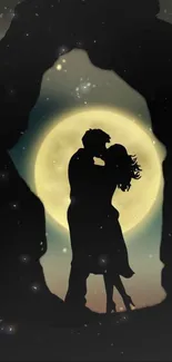 Silhouette of couple kissing under the moon.