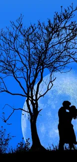 Silhouette couple kissing under a blue moon background.